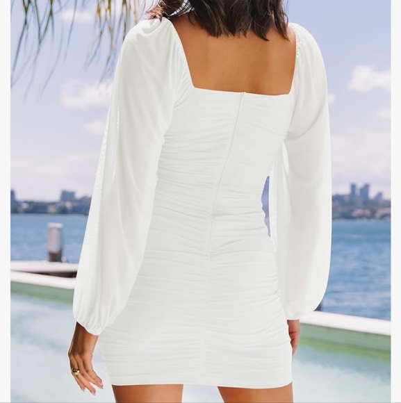Elegant White Dress With Semi Transparent Sleeves - Picture 4 of 16